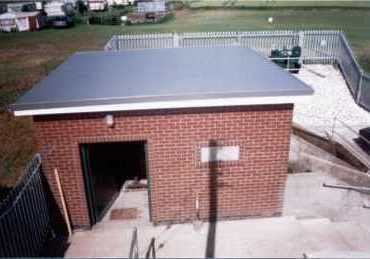 outhouse with a fibreglass roof