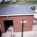 outhouse with a fibreglass roof
